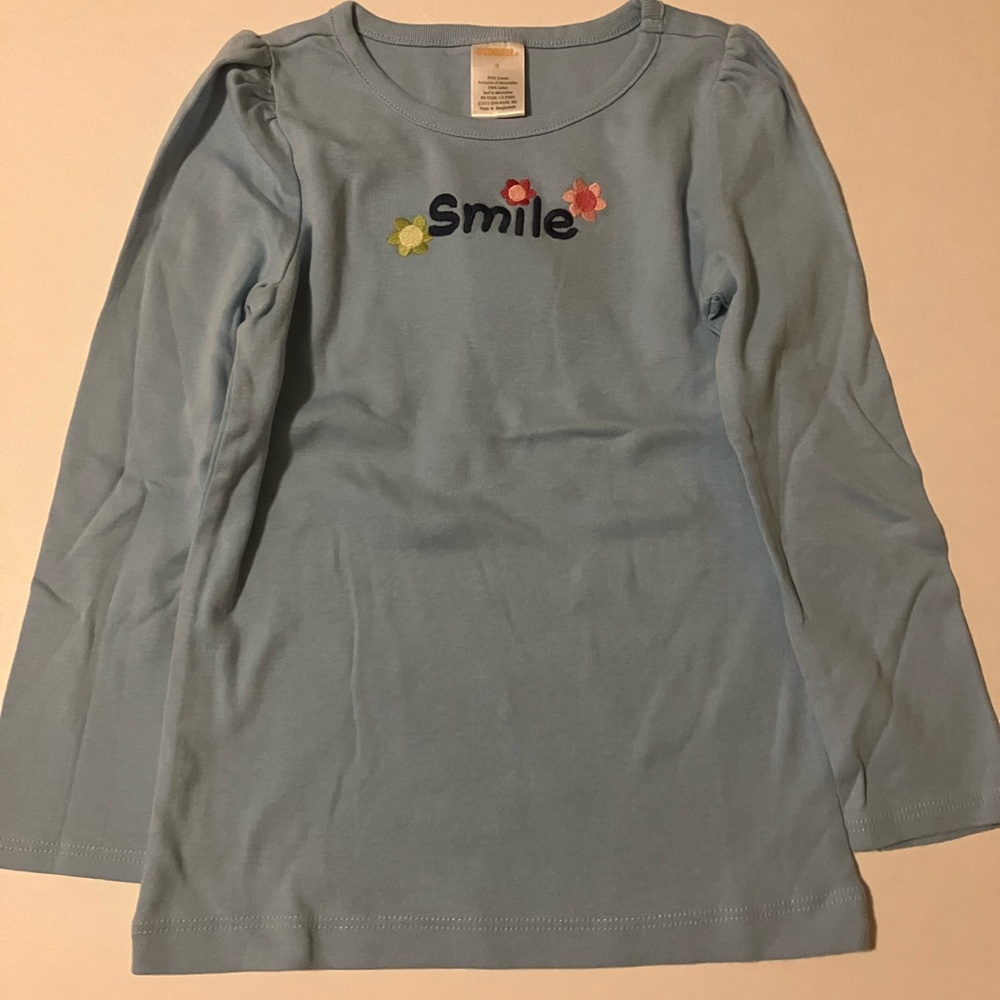 NWT Blue longsleeve with smile decal